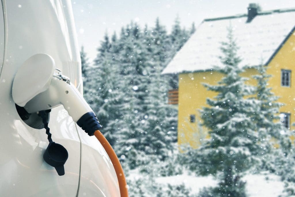 Electric car charging batteries with snowy landscape 1536x1024 1