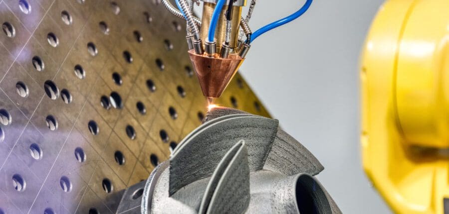 Simulate to success for additive manufacturing (AM) 1 3D metal printer produces a steel part Adobe 353001885 900x600 1