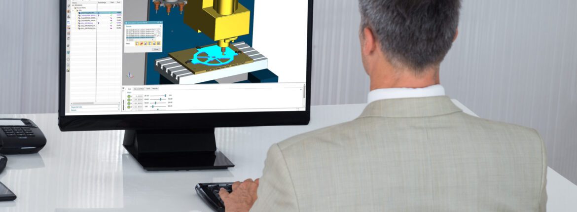 Hoàn Thiện Cổng Nạp (Intake port) Với Máy 5 Trục HAAS UMC750: Quy Trình CNC Hiện Đại Đột Phá 1 Computer man suit monitor iStock 622215652CAM Pro 1 scaled