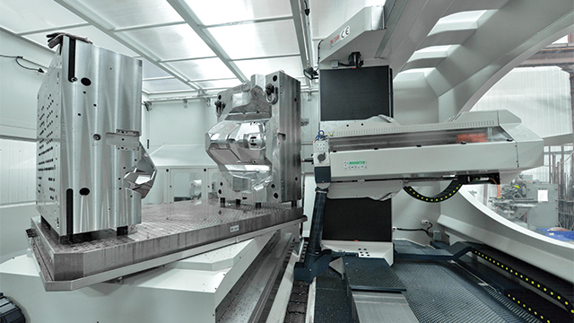 Mold design software isn't a carton of milk - Partners 2 High tech mold and tooling machinery in action